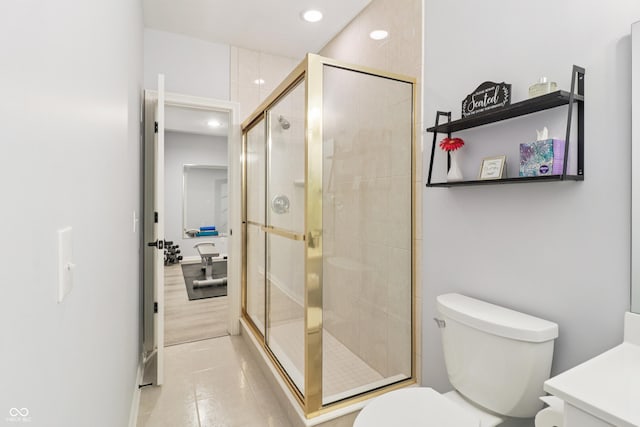 12068 Bayhill Dr, Carmel, IN 46033 - bathroom with vanity, a stall shower, tile patterned floors, and recessed lighting