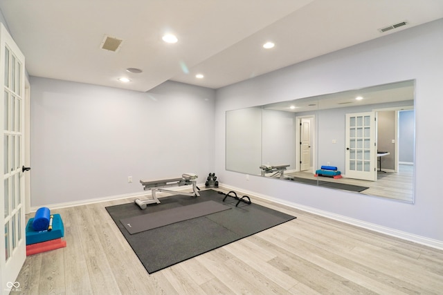 12068 Bayhill Dr, Carmel, IN 46033 - exercise area with french doors, wood finished floors, and recessed lighting