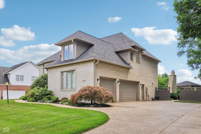 12068 Bayhill Dr, Carmel, IN 46033 - view of side of property featuring driveway, roof with shingles, and brick siding