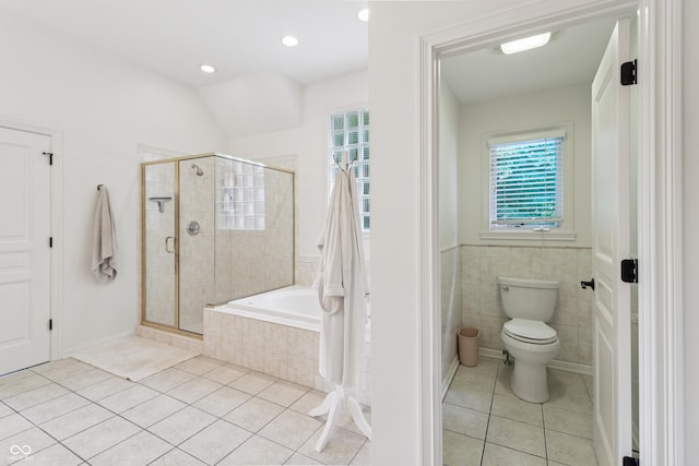 12068 Bayhill Dr, Carmel, IN 46033 - bathroom featuring tile patterned flooring, a stall shower, tiled tub, and recessed lighting