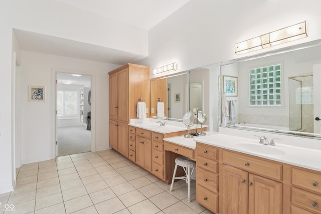 12068 Bayhill Dr, Carmel, IN 46033 - full bath featuring a stall shower, vanity, a bath, and tile patterned floors