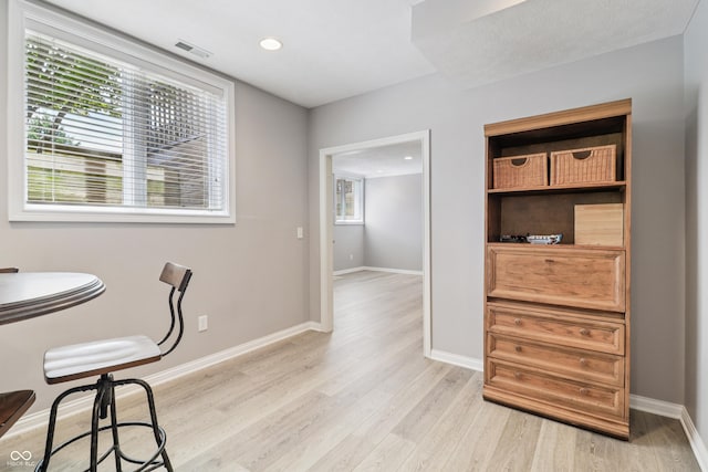 12068 Bayhill Dr, Carmel, IN 46033 - dining room with light wood-type flooring and recessed lighting