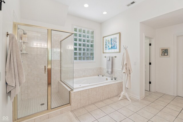 12068 Bayhill Dr, Carmel, IN 46033 - full bathroom featuring a bath, a shower stall, tile patterned flooring, and recessed lighting