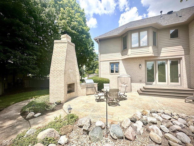 12068 Bayhill Dr, Carmel, IN 46033 - view of patio / terrace featuring an outdoor kitchen