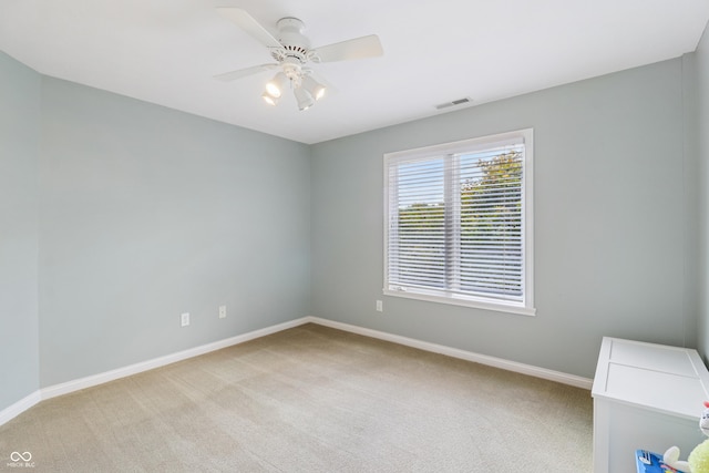 12068 Bayhill Dr, Carmel, IN 46033 - spare room with light colored carpet and ceiling fan