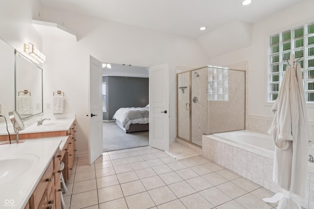12068 Bayhill Dr, Carmel, IN 46033 - full bath with double vanity, healthy amount of natural light, a bath, a shower stall, and recessed lighting