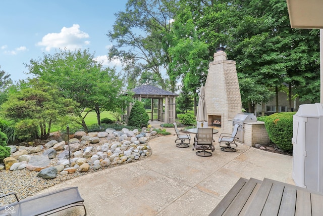 12068 Bayhill Dr, Carmel, IN 46033 - view of patio with an outdoor brick fireplace, a gazebo, grilling area, and outdoor dining space