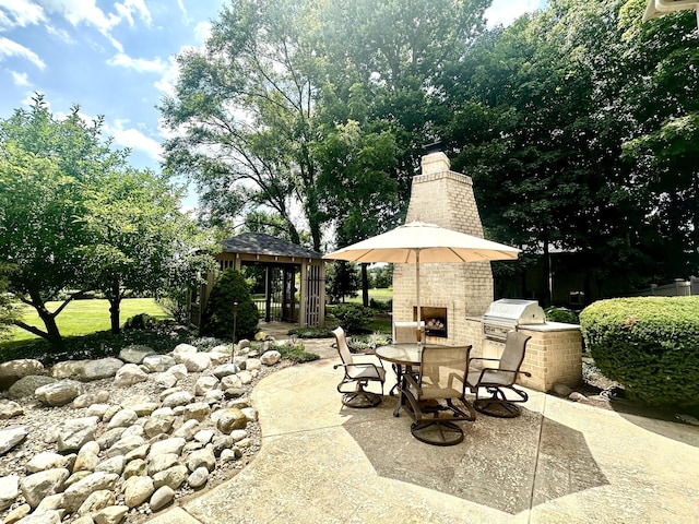 12068 Bayhill Dr, Carmel, IN 46033 - view of patio with an outdoor kitchen, outdoor dining area, and an outdoor structure