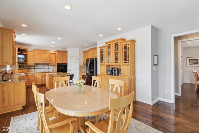 12068 Bayhill Dr, Carmel, IN 46033 - dining space with dark wood-type flooring and recessed lighting