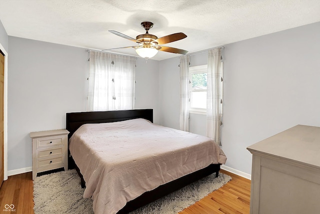 1328 E 600 N, West Lafayette, IN 47906 - bedroom featuring light wood-type flooring and a ceiling fan