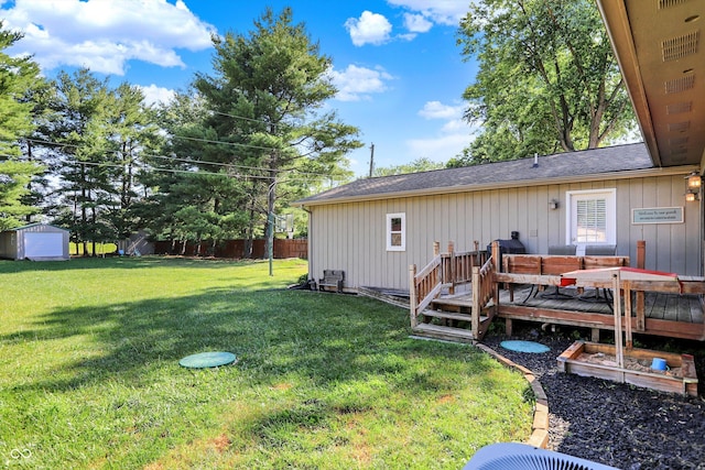 1328 E 600 N, West Lafayette, IN 47906 - view of yard with a deck and a storage unit