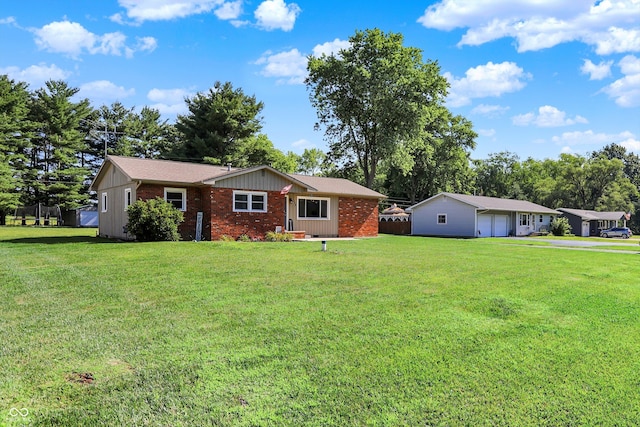 1328 E 600 N, West Lafayette, IN 47906 - single story home featuring a front yard, brick siding, board and batten siding, and view of scattered trees