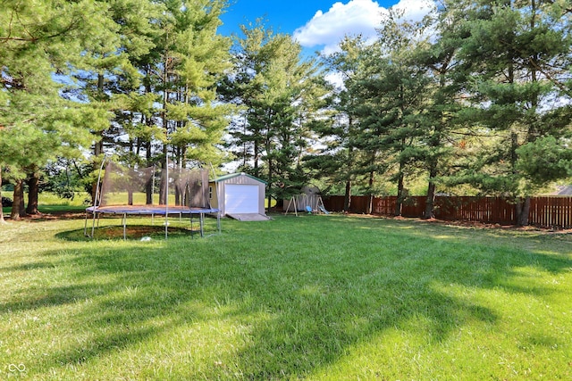 1328 E 600 N, West Lafayette, IN 47906 - view of yard featuring a trampoline, a storage unit, and a playground
