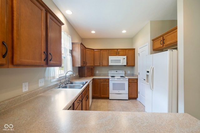 471 Harvest Moon Dr, Greencastle, IN 46135 - kitchen with white appliances, brown cabinetry, light countertops, recessed lighting, and light tile patterned flooring