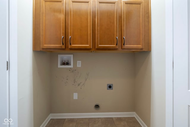 471 Harvest Moon Dr, Greencastle, IN 46135 - laundry area featuring hookup for a washing machine, cabinet space, and electric dryer hookup
