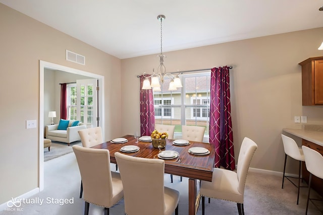471 Harvest Moon Dr, Greencastle, IN 46135 - dining space featuring a chandelier and carpet floors