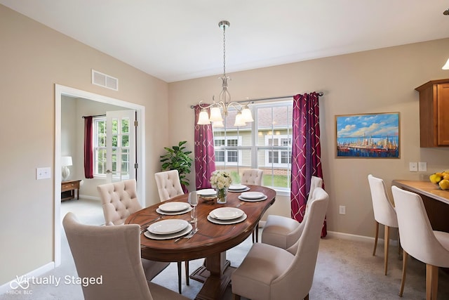 471 Harvest Moon Dr, Greencastle, IN 46135 - dining area with a chandelier and light colored carpet