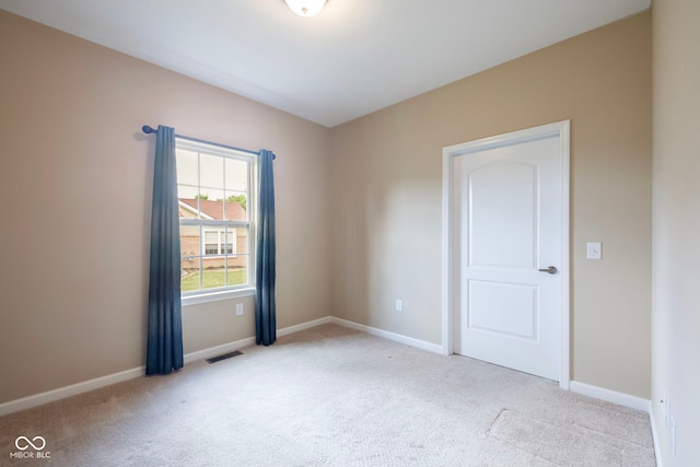 471 Harvest Moon Dr, Greencastle, IN 46135 - spare room featuring light carpet and baseboards