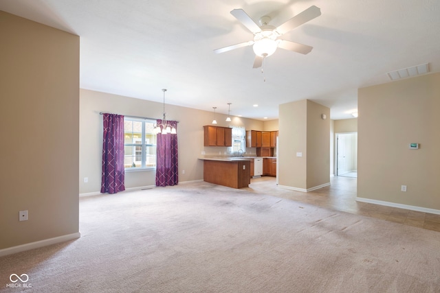 471 Harvest Moon Dr, Greencastle, IN 46135 - unfurnished living room featuring light colored carpet, ceiling fan, a chandelier, and recessed lighting