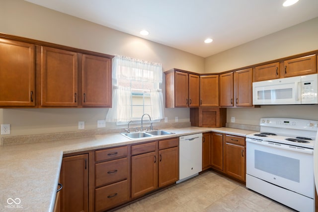 471 Harvest Moon Dr, Greencastle, IN 46135 - kitchen featuring white appliances, brown cabinetry, light countertops, and recessed lighting
