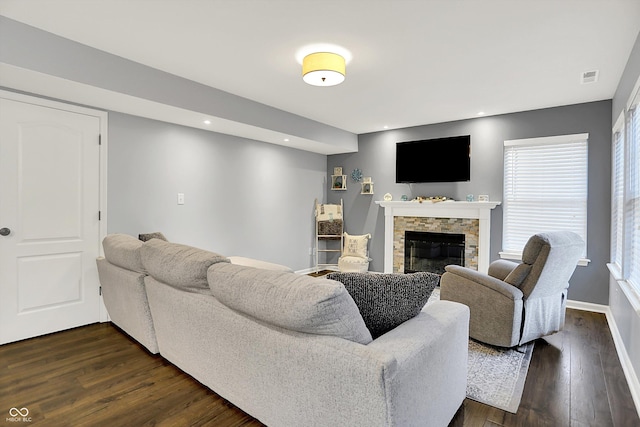 17101 Rushmore Dr, Westfield, IN 46074 - living room with dark wood-style flooring and a fireplace