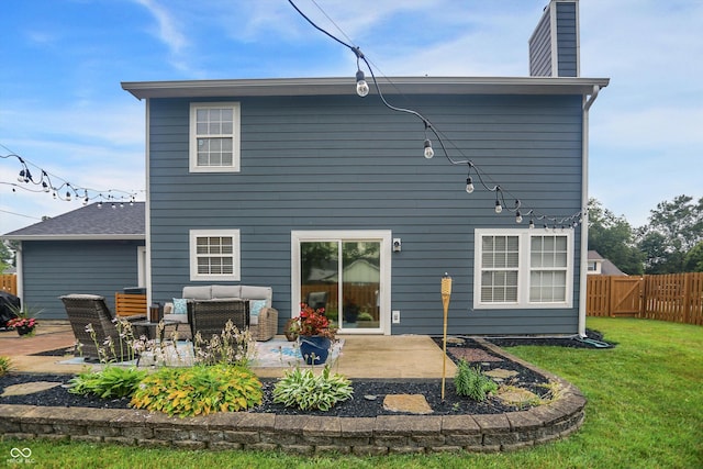 17101 Rushmore Dr, Westfield, IN 46074 - rear view of house with a patio area, a chimney, and an outdoor hangout area
