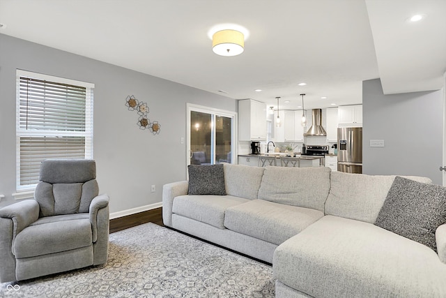 17101 Rushmore Dr, Westfield, IN 46074 - living room with dark wood-style floors and recessed lighting
