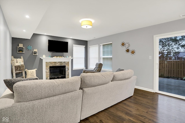 17101 Rushmore Dr, Westfield, IN 46074 - living room featuring dark wood-style flooring, recessed lighting, and a fireplace