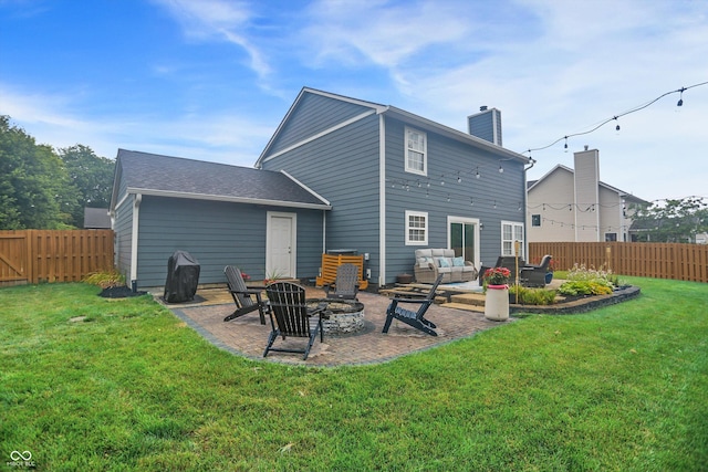 17101 Rushmore Dr, Westfield, IN 46074 - back of property with an outdoor living space with a fire pit, a chimney, a patio, and a fenced backyard