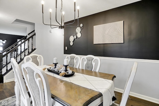 17101 Rushmore Dr, Westfield, IN 46074 - dining space featuring a chandelier, wood finished floors, and stairway