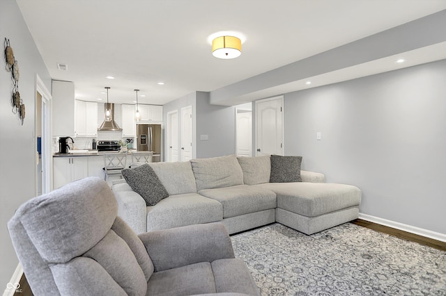 17101 Rushmore Dr, Westfield, IN 46074 - living area featuring wood finished floors and recessed lighting