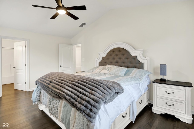 17101 Rushmore Dr, Westfield, IN 46074 - bedroom with vaulted ceiling, dark wood-type flooring, and a ceiling fan