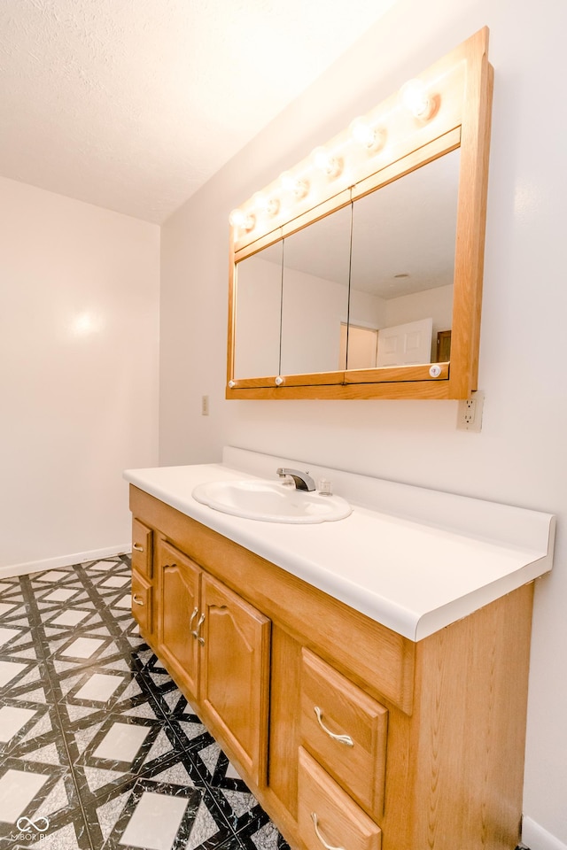 4729 Hittle Dr, Indianapolis, IN 46239 - bathroom with inlaid floor details and vanity