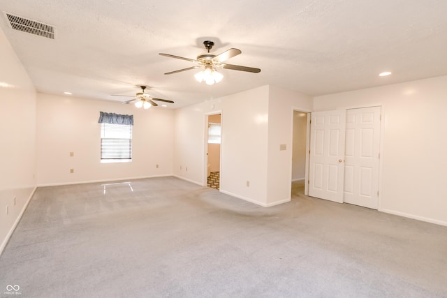 4729 Hittle Dr, Indianapolis, IN 46239 - unfurnished room with ceiling fan, light colored carpet, and recessed lighting