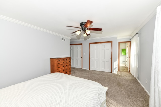 3012 Rollshore Ct, Carmel, IN 46033 - carpeted bedroom featuring two closets, ornamental molding, and ceiling fan