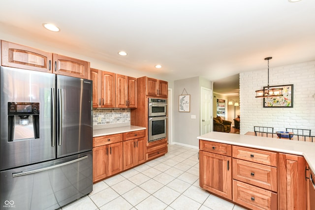 3012 Rollshore Ct, Carmel, IN 46033 - kitchen with appliances with stainless steel finishes, light countertops, light tile patterned flooring, decorative backsplash, and recessed lighting