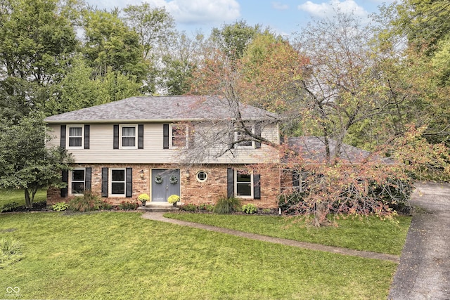 3012 Rollshore Ct, Carmel, IN 46033 - colonial inspired home featuring a front lawn and brick siding