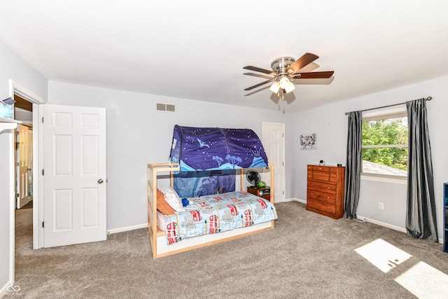 3012 Rollshore Ct, Carmel, IN 46033 - carpeted bedroom with baseboards and a ceiling fan