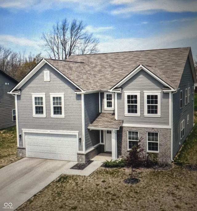 10524 Broadford St, Indianapolis, IN 46239 - traditional-style home featuring an attached garage, concrete driveway, and a shingled roof