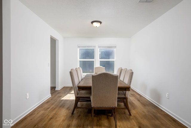 10524 Broadford St, Indianapolis, IN 46239 - dining room featuring wood finished floors and baseboards