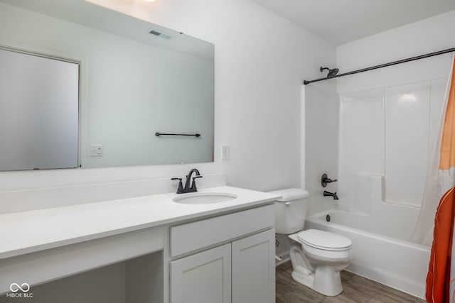 10524 Broadford St, Indianapolis, IN 46239 - bathroom featuring vanity, wood finished floors, and shower / tub combo