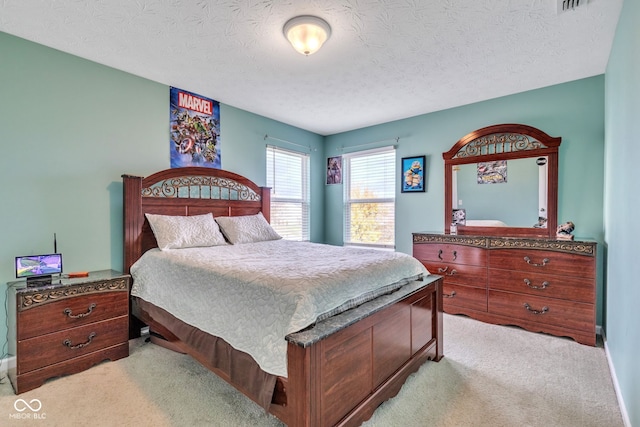 1358 Avocet Dr, Greenwood, IN 46143 - bedroom with light colored carpet and a textured ceiling