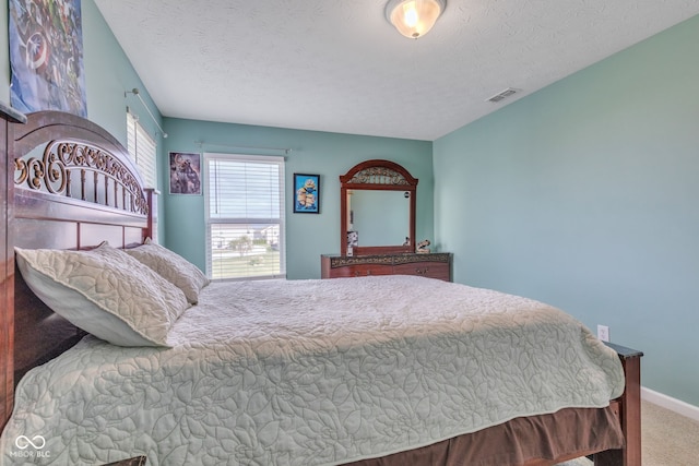 1358 Avocet Dr, Greenwood, IN 46143 - carpeted bedroom with a textured ceiling