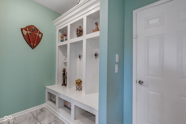 1358 Avocet Dr, Greenwood, IN 46143 - mudroom with light marble finish floors and baseboards