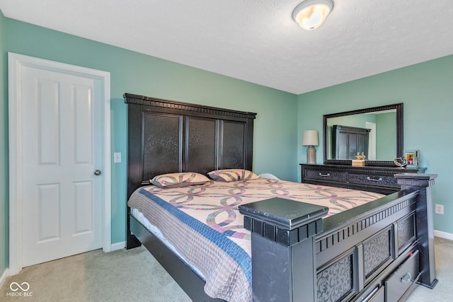 1358 Avocet Dr, Greenwood, IN 46143 - bedroom featuring light colored carpet and a textured ceiling