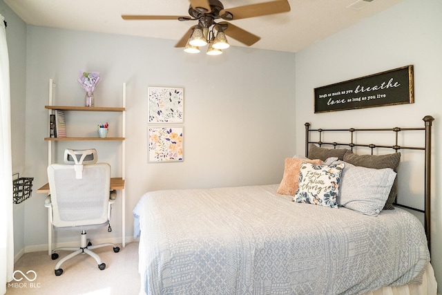 5322 Lily Pad Ln, Indianapolis, IN 46237 - carpeted bedroom with baseboards and ceiling fan