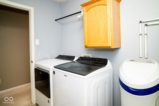 5322 Lily Pad Ln, Indianapolis, IN 46237 - laundry room featuring independent washer and dryer and cabinet space