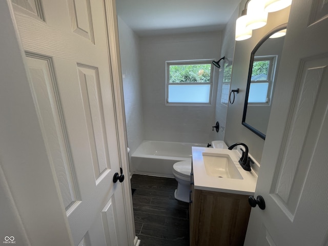 3119 N Fuller Dr, Indianapolis, IN 46224 - full bath featuring vanity, wood finished floors, and shower / washtub combination