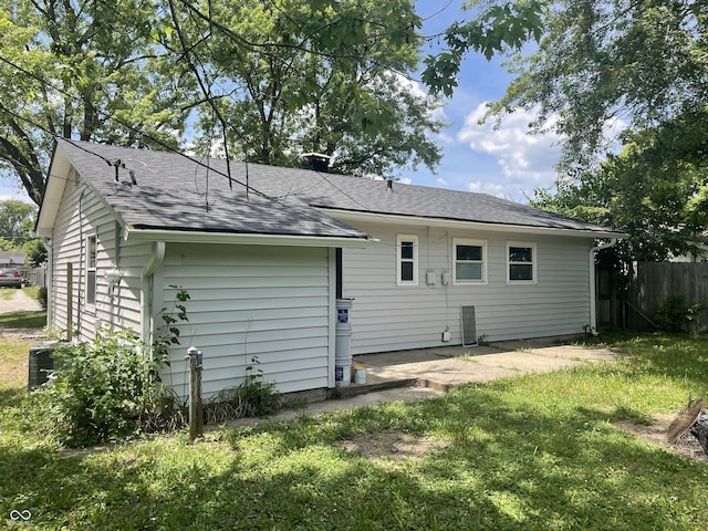 3119 N Fuller Dr, Indianapolis, IN 46224 - back of house with a patio and a shingled roof
