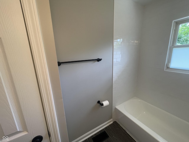 3119 N Fuller Dr, Indianapolis, IN 46224 - full bathroom with tub / shower combination and wood finished floors